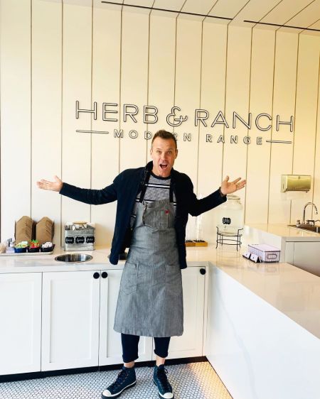 Chef Brian Malarkey poses in his restaurant named Herb & Ranch.
